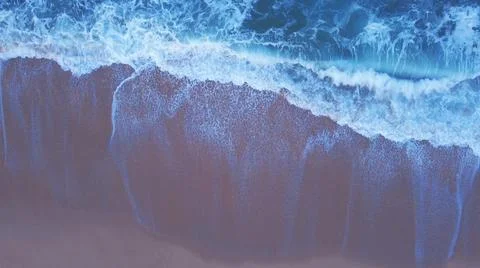 Aerial Drone top down view of Sea Waves Stock Photos