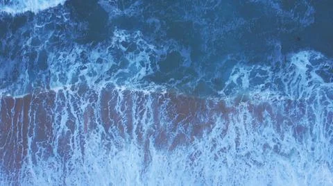 Aerial Drone top down view of Sea Waves Stock Photos