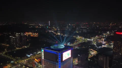 Aerial drone top night view of illuminated city skyscraper rooftop media facade. Stock-Footage 340636686