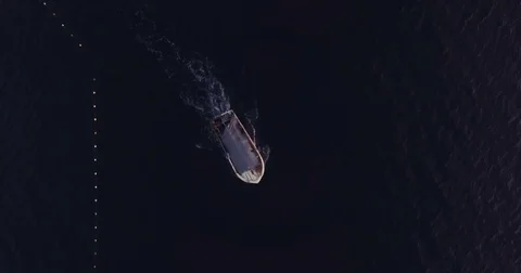 Aerial Drone Top shot Over A Small Boat Stock Footage 75132686
