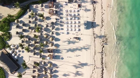 Aerial drone top view crowd of people at tropical Beach with sunset Stock Footage 274374744