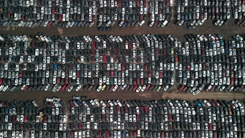 Aerial drone top view of large car parking of car dealer. Secondhand used cars. Video stock 233113875