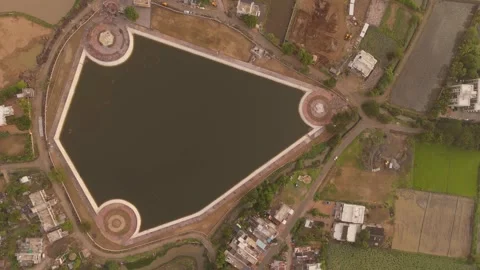 Aerial drone top view of a modern man made water reservoir with geometric design Stock Footage 341084371
