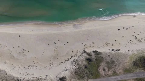 Aerial drone top view of sandy beach and turquoise sea Stock Footage 324529533