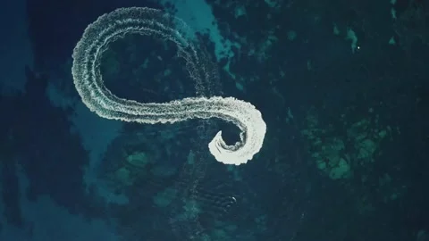 Aerial Drone Top View Spin Boat Rushing in Blue Water Sardinia Italy Eight Figur Stock Footage 146581599