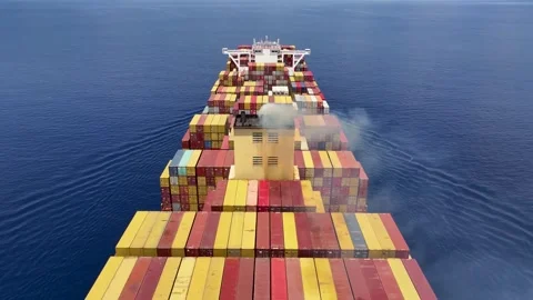 Aerial drone top view video of heavy loaded cargo container ship Stock Footage 263476871