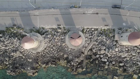 Aerial drone topdown flight above windmills on Rhodes port 스톡 동영상 169879383