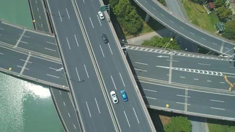 Aerial drone topdown view of highway multi-level junction road with moving cars Stock Footage 152875568