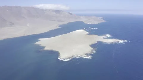 Aerial Drone track back, Isla Santa Maria on Mejillones Peninsula, Antofagast Stock Footage 209262471