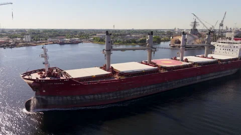 Aerial Drone Tracking Cargo Ship and Tugboat on Elizabeth River Near Norfolk Видео 336446295