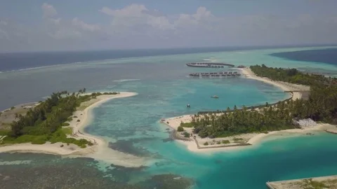 Aerial Drone Tracking down and into Maldives Islands Stock-Footage 80942079