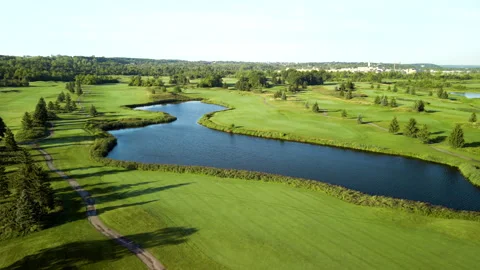 Aerial Drone Tracking Golf Course on Niagara Escarpment at Sunrise – 4K 30fps Stock Footage 313910086
