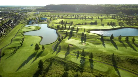 Aerial Drone Tracking Golf Course on Niagara Escarpment at Sunrise – 4K 30fps Stock Footage 313910175
