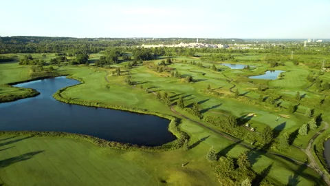 Aerial Drone Tracking Golf Course on Niagara Escarpment at Sunrise – 4K 30fps Stock Footage 313910467