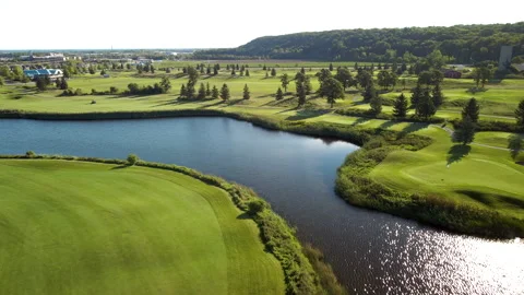 Aerial Drone Tracking Golf Course on Niagara Escarpment at Sunrise – 4K 30fps Stock Footage 313910544