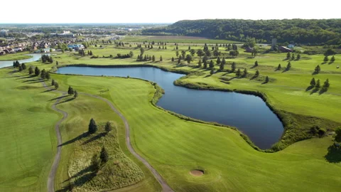 Aerial Drone Tracking Golf Course on Niagara Escarpment at Sunrise – 4K 30fps Stock Footage 313911041