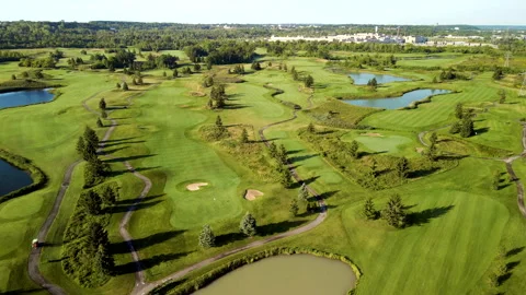 Aerial Drone Tracking Golf Course on Niagara Escarpment at Sunrise – 4K 30fps Stock Footage 313911265