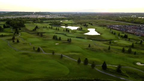 Aerial Drone Tracking Golf Course on Niagara Escarpment at Sunset – 4K 30fps Stock Footage 318843856