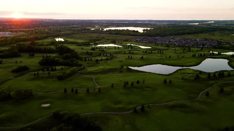 Aerial Drone Tracking Golf Course on Niagara Escarpment at Sunset – 4K 30fps Stock Footage 318844044