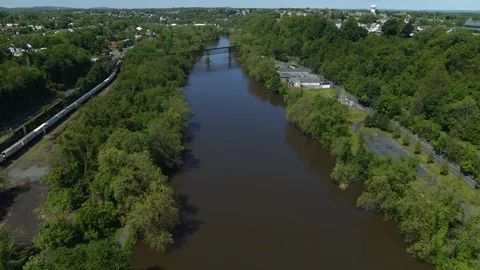 Aerial Drone Train Along Deleware River 3 Stock Footage 122552415