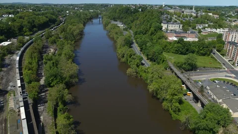Aerial Drone Train Along River 2 Stock Footage 122408167