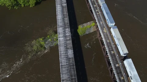 Aerial Drone Train on Bridge over Deleware River Stock Footage 122613131