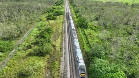 Aerial Drone Train Crossing through Rural Area Stock Footage 233560154
