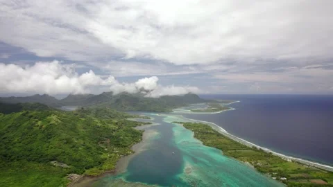 Aerial Drone of Turquoise Lagoon between Motu and Huahine 10Bit Stock Footage 171611219