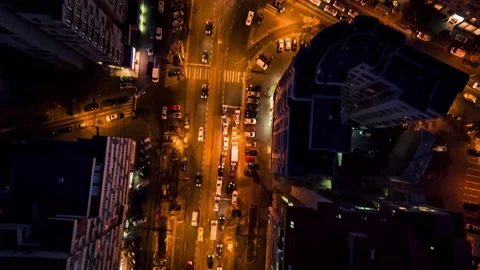 Aerial drone vertical view of Bucharest streets and Victory square at night Stock Footage 131235802