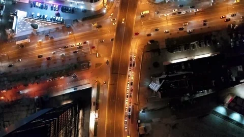 Aerial drone vertical view of Bucharest city centre square traffic hour at night Stock Footage 131235882