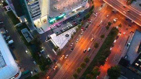 Aerial drone vertical view of Bucharest city centre square traffic hour at night Stock Footage 131236104