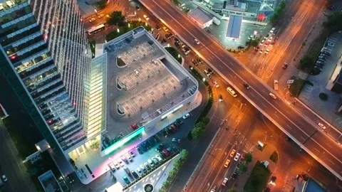 Aerial drone vertical view of Bucharest city centre square traffic hour at night Stock Footage 131236296