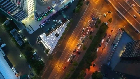 Aerial drone vertical view of Bucharest city centre square traffic hour at night Stock Footage 131236437