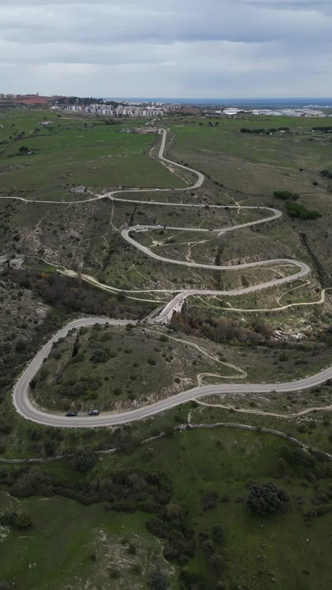 Aerial drone vertical view of winding hairpin roads on the M-618 Stock Footage 293253619