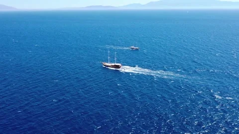 Aerial Drone Video of Beautiful Sailing Yacht in Open Sea Stock Footage