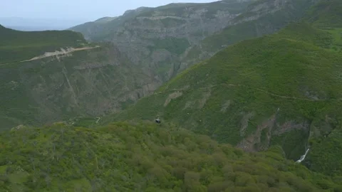 Aerial drone video cable car over mountain road armenia landscape Wings of Tatev Stock Footage 324468256