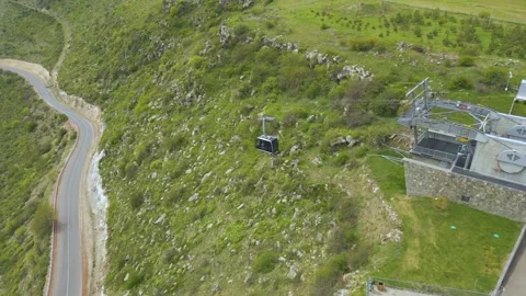 Aerial drone video cable car over mountain road armenia landscape Wings of Tatev Stock Footage 324497267