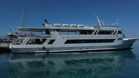 Aerial drone video of a drone flying around the ship, Agistri Island, Saronic Stock Footage 251253353