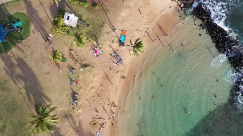 Aerial drone video of Exploring the Hidden Beauty of Kauai: Poipu beach Stock Footage 303931804
