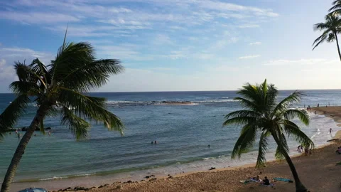 Aerial drone video of Exploring the Hidden Beauty of Kauai: Poipu Beach Stock Footage 303932974