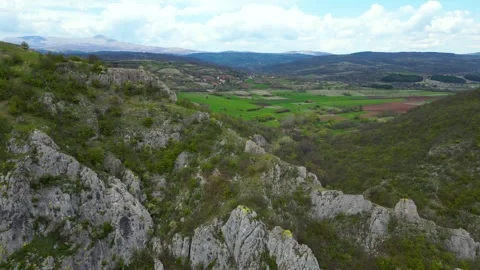 Aerial drone video, flying over river Moravica in Sokobanja, between two hills Stock Footage 241285171