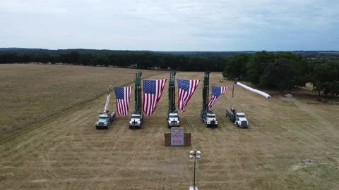 Aerial Drone Video of Large Flags Waving in the WInd on the 4th of July Vídeo Stock 245361753
