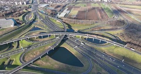 Aerial drone video of large scale highway intersection in The Netherlands 스톡 동영상 293509050