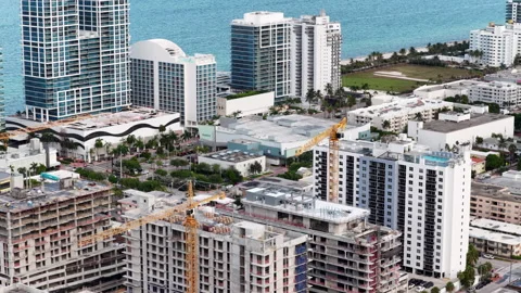 Aerial drone video multiple projects under construction Miami North Beach Stock Footage 344051868