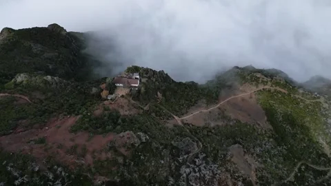Aerial drone video of pico do areiro and the refuge Stock Footage 243284227