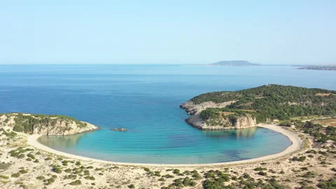 Aerial drone video of semicircular sandy beach and lagoon of Voidokilia, one  Видео 158176038