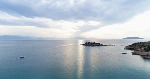 Aerial drone video of sunset over the Aegean sea and Greek islands with Stock Footage 101400030