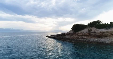 Aerial drone video of sunset over the Aegean sea and Greek islands with Stock Footage 101400557