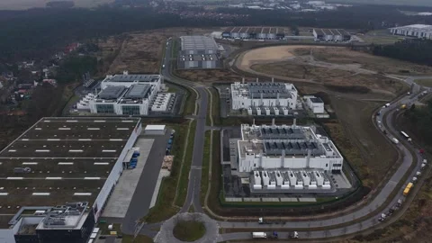 Aerial drone video of the Vantage Data Centers Berlin I campus large-scale Stock Footage 325495888