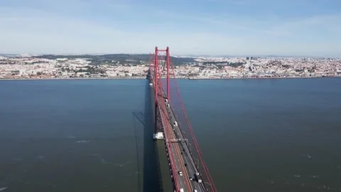 Aerial Drone view of the 25 De April Bridge. Red bridge in Lisbon, Portugal.  Stock Footage 151232349